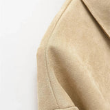 Casaco com Detalhes Vazados – Sofisticação Atemporal e Design Autoral