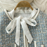 ConjuntoTweed Xadrez – Blazer Manga Longa + Saia A-Line Assimétrica