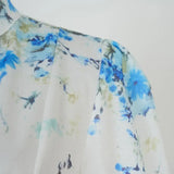 Vestido Azul Floral com Gola Alta e Cintura Império – Elegância Atemporal